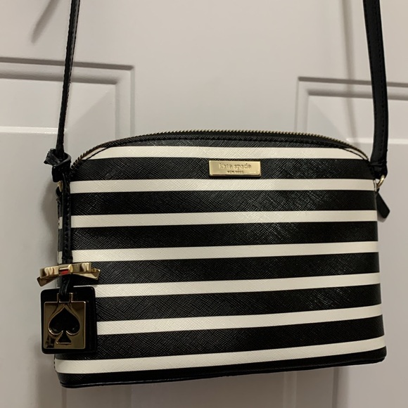 kate spade Handbags - Kate Spade Black and White Striped Crossbody Bag with Gold Charm